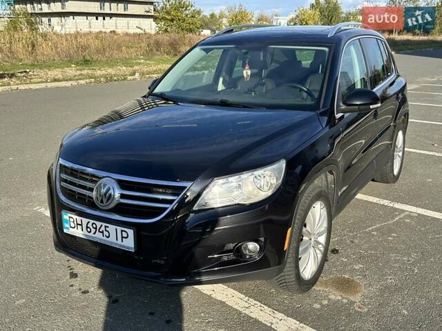 Черный Фольксваген Тигуан, объемом двигателя 2 л и пробегом 237 тыс. км за 10100 $, фото 1 на Automoto.ua