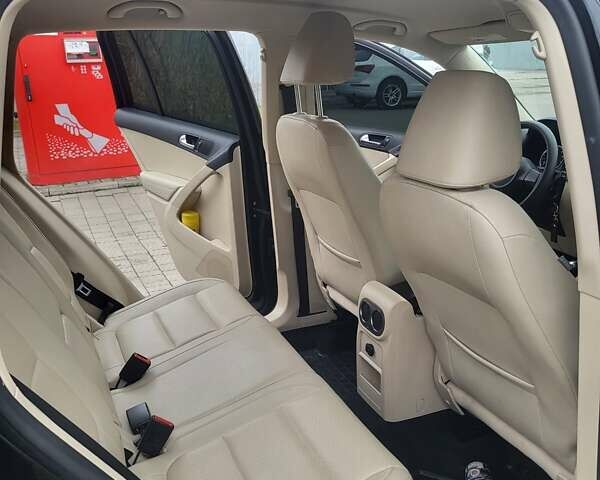 Черный Фольксваген Тигуан, объемом двигателя 1.98 л и пробегом 182 тыс. км за 9555 $, фото 4 на Automoto.ua