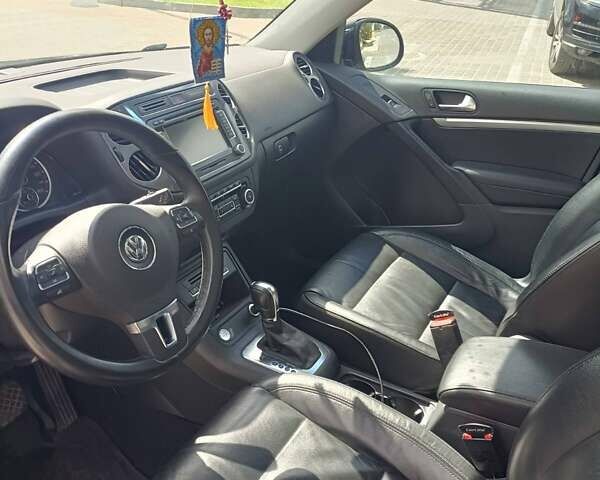 Черный Фольксваген Тигуан, объемом двигателя 2 л и пробегом 259 тыс. км за 11900 $, фото 11 на Automoto.ua