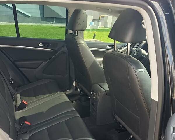 Черный Фольксваген Тигуан, объемом двигателя 2 л и пробегом 259 тыс. км за 11900 $, фото 14 на Automoto.ua