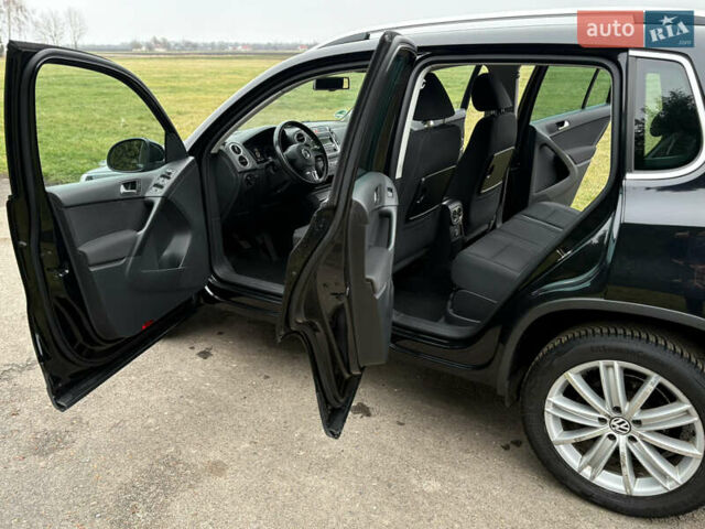 Черный Фольксваген Тигуан, объемом двигателя 1.39 л и пробегом 213 тыс. км за 9399 $, фото 21 на Automoto.ua