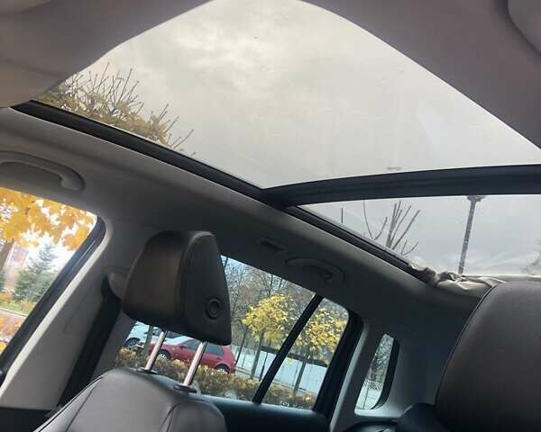 Чорний Фольксваген Тігуан, об'ємом двигуна 1.98 л та пробігом 239 тис. км за 11400 $, фото 2 на Automoto.ua