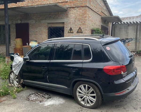 Чорний Фольксваген Тігуан, об'ємом двигуна 2 л та пробігом 270 тис. км за 2999 $, фото 1 на Automoto.ua