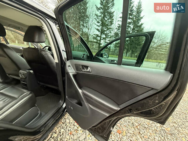 Чорний Фольксваген Тігуан, об'ємом двигуна 2 л та пробігом 238 тис. км за 10599 $, фото 34 на Automoto.ua