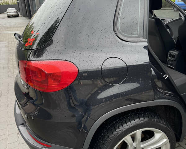 Черный Фольксваген Тигуан, объемом двигателя 1.98 л и пробегом 186 тыс. км за 11000 $, фото 7 на Automoto.ua