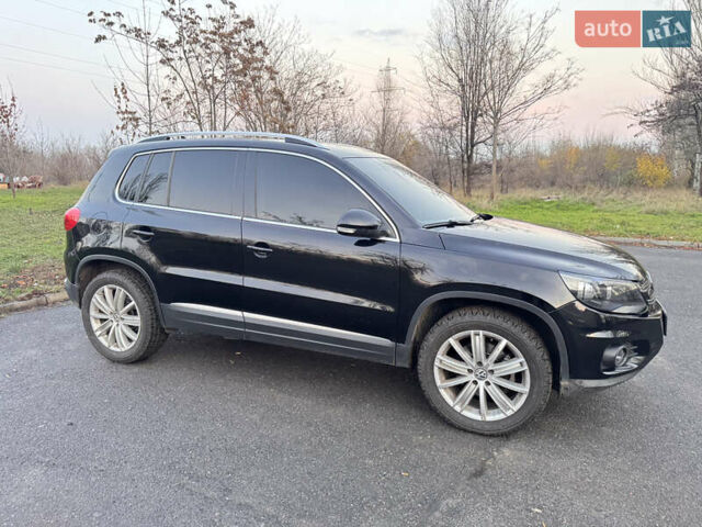 Черный Фольксваген Тигуан, объемом двигателя 1.98 л и пробегом 219 тыс. км за 11700 $, фото 2 на Automoto.ua