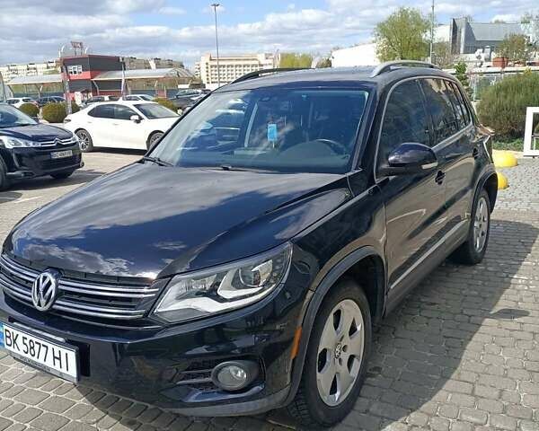 Черный Фольксваген Тигуан, объемом двигателя 2 л и пробегом 259 тыс. км за 11900 $, фото 2 на Automoto.ua