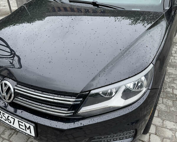 Черный Фольксваген Тигуан, объемом двигателя 1.98 л и пробегом 186 тыс. км за 11000 $, фото 1 на Automoto.ua