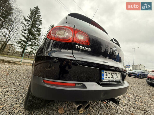 Чорний Фольксваген Тігуан, об'ємом двигуна 2 л та пробігом 238 тис. км за 10599 $, фото 18 на Automoto.ua