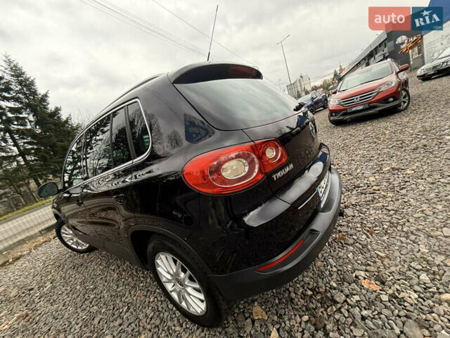 Чорний Фольксваген Тігуан, об'ємом двигуна 2 л та пробігом 238 тис. км за 10599 $, фото 16 на Automoto.ua