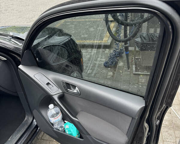 Черный Фольксваген Тигуан, объемом двигателя 1.98 л и пробегом 186 тыс. км за 11000 $, фото 30 на Automoto.ua