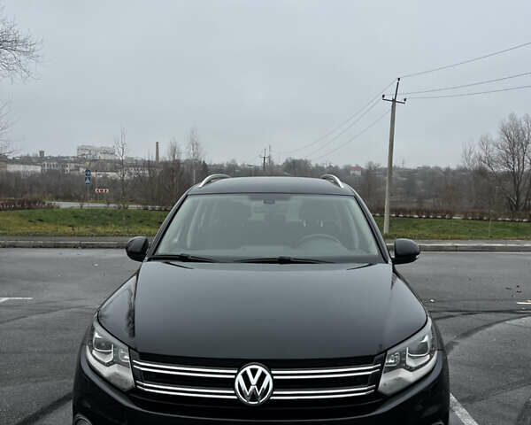 Черный Фольксваген Тигуан, объемом двигателя 1.98 л и пробегом 169 тыс. км за 12000 $, фото 1 на Automoto.ua