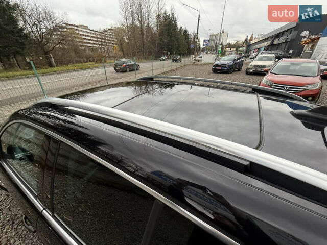 Чорний Фольксваген Тігуан, об'ємом двигуна 2 л та пробігом 238 тис. км за 10599 $, фото 74 на Automoto.ua