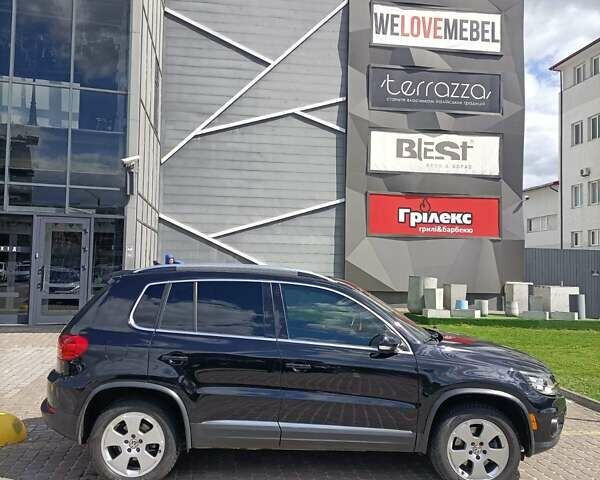 Черный Фольксваген Тигуан, объемом двигателя 2 л и пробегом 259 тыс. км за 11900 $, фото 5 на Automoto.ua