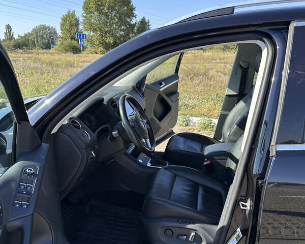 Черный Фольксваген Тигуан, объемом двигателя 1.98 л и пробегом 123 тыс. км за 14800 $, фото 16 на Automoto.ua