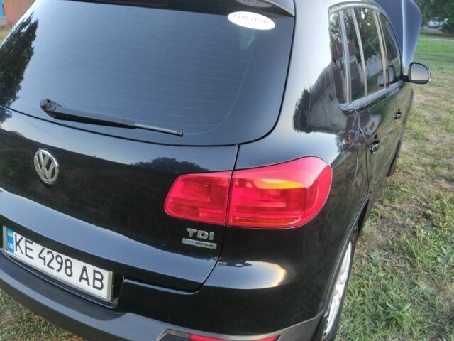 Чорний Фольксваген Тігуан, об'ємом двигуна 2 л та пробігом 370 тис. км за 8600 $, фото 2 на Automoto.ua