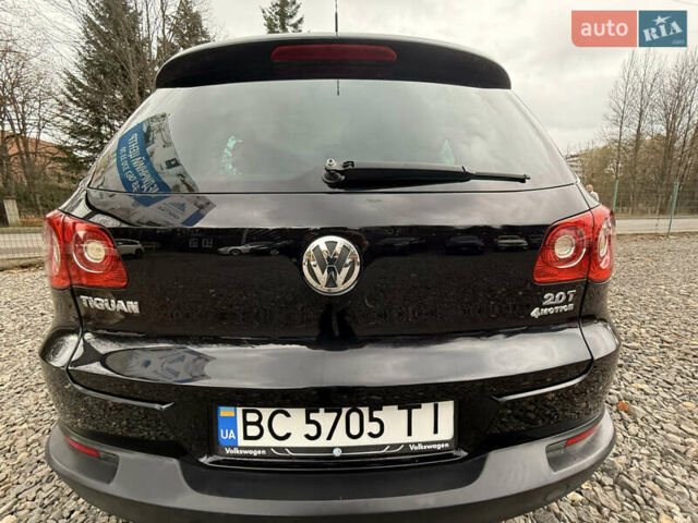 Чорний Фольксваген Тігуан, об'ємом двигуна 2 л та пробігом 238 тис. км за 10599 $, фото 67 на Automoto.ua