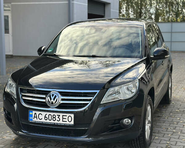 Черный Фольксваген Тигуан, объемом двигателя 1.98 л и пробегом 210 тыс. км за 12000 $, фото 2 на Automoto.ua