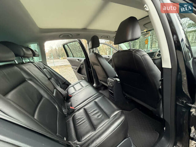 Чорний Фольксваген Тігуан, об'ємом двигуна 2 л та пробігом 238 тис. км за 10599 $, фото 33 на Automoto.ua