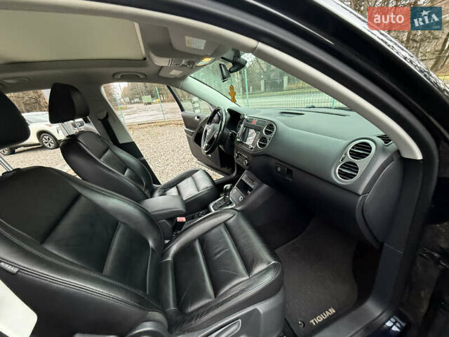 Чорний Фольксваген Тігуан, об'ємом двигуна 2 л та пробігом 238 тис. км за 10599 $, фото 24 на Automoto.ua