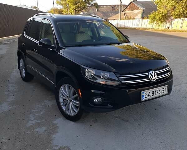 Чорний Фольксваген Тігуан, об'ємом двигуна 1.98 л та пробігом 231 тис. км за 10500 $, фото 1 на Automoto.ua