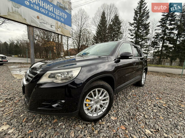 Чорний Фольксваген Тігуан, об'ємом двигуна 2 л та пробігом 238 тис. км за 10599 $, фото 58 на Automoto.ua