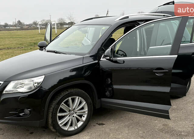 Черный Фольксваген Тигуан, объемом двигателя 1.39 л и пробегом 213 тыс. км за 9399 $, фото 24 на Automoto.ua