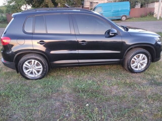 Чорний Фольксваген Тігуан, об'ємом двигуна 2 л та пробігом 370 тис. км за 8600 $, фото 6 на Automoto.ua