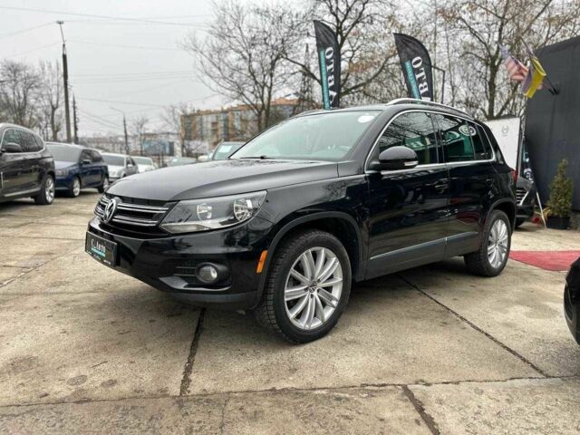 Черный Фольксваген Тигуан, объемом двигателя 2 л и пробегом 156 тыс. км за 12700 $, фото 1 на Automoto.ua