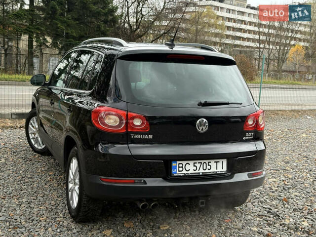 Чорний Фольксваген Тігуан, об'ємом двигуна 2 л та пробігом 238 тис. км за 10599 $, фото 70 на Automoto.ua