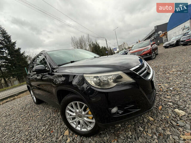 Чорний Фольксваген Тігуан, об'ємом двигуна 2 л та пробігом 238 тис. км за 10599 $, фото 1 на Automoto.ua