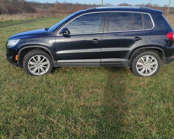 Чорний Фольксваген Тігуан, об'ємом двигуна 2 л та пробігом 285 тис. км за 9700 $, фото 1 на Automoto.ua