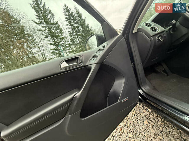 Чорний Фольксваген Тігуан, об'ємом двигуна 2 л та пробігом 238 тис. км за 10599 $, фото 44 на Automoto.ua