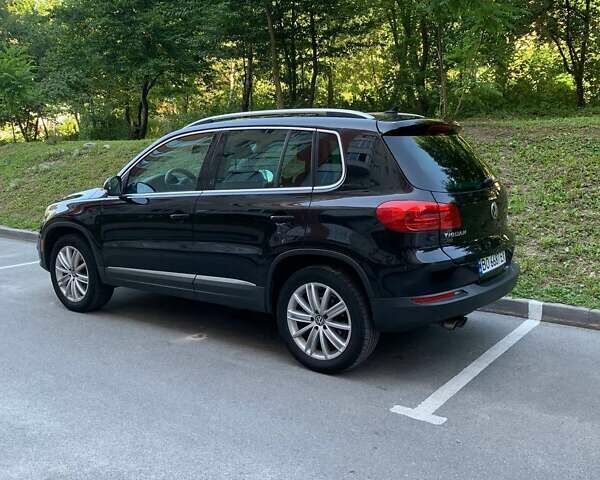 Чорний Фольксваген Тігуан, об'ємом двигуна 2 л та пробігом 226 тис. км за 11600 $, фото 1 на Automoto.ua