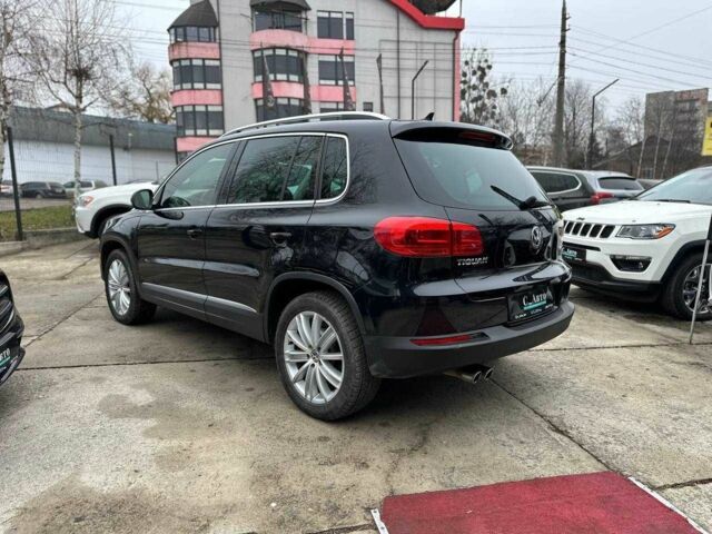 Черный Фольксваген Тигуан, объемом двигателя 2 л и пробегом 156 тыс. км за 12700 $, фото 2 на Automoto.ua