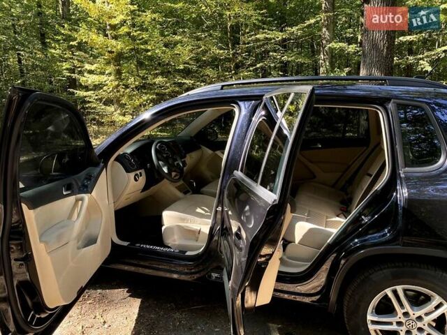 Черный Фольксваген Тигуан, объемом двигателя 2 л и пробегом 250 тыс. км за 12000 $, фото 16 на Automoto.ua