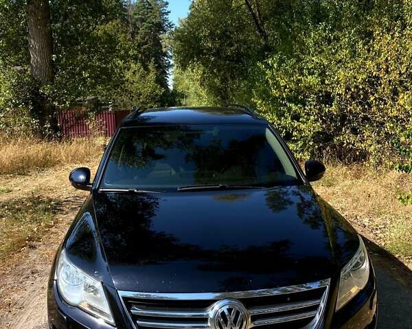 Черный Фольксваген Тигуан, объемом двигателя 2 л и пробегом 250 тыс. км за 12000 $, фото 5 на Automoto.ua