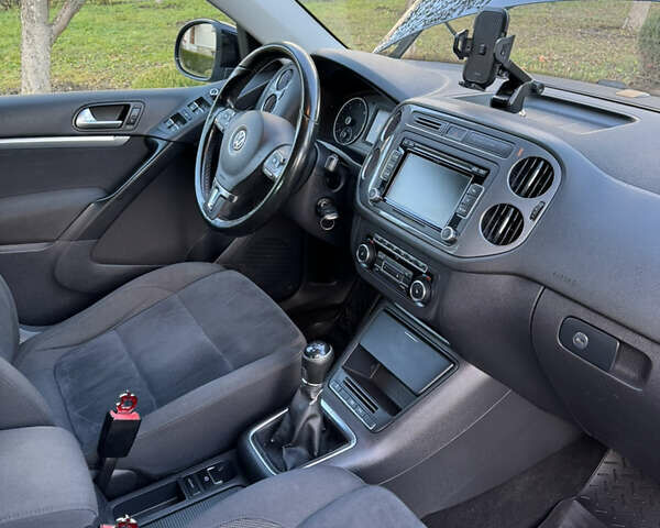 Черный Фольксваген Тигуан, объемом двигателя 1.97 л и пробегом 182 тыс. км за 14000 $, фото 22 на Automoto.ua