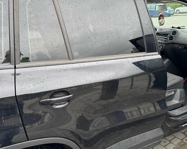 Черный Фольксваген Тигуан, объемом двигателя 1.98 л и пробегом 186 тыс. км за 11000 $, фото 6 на Automoto.ua