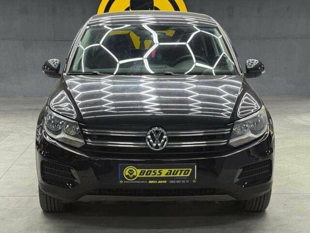 Черный Фольксваген Тигуан, объемом двигателя 2 л и пробегом 186 тыс. км за 12300 $, фото 1 на Automoto.ua