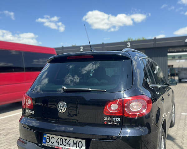 Чорний Фольксваген Тігуан, об'ємом двигуна 1.97 л та пробігом 386 тис. км за 10500 $, фото 9 на Automoto.ua