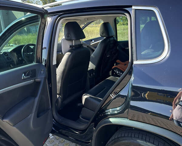 Черный Фольксваген Тигуан, объемом двигателя 1.98 л и пробегом 123 тыс. км за 14800 $, фото 21 на Automoto.ua