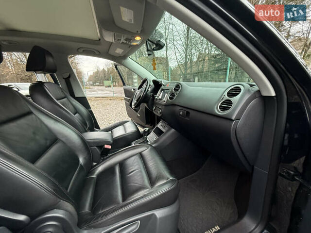 Чорний Фольксваген Тігуан, об'ємом двигуна 2 л та пробігом 238 тис. км за 10599 $, фото 19 на Automoto.ua