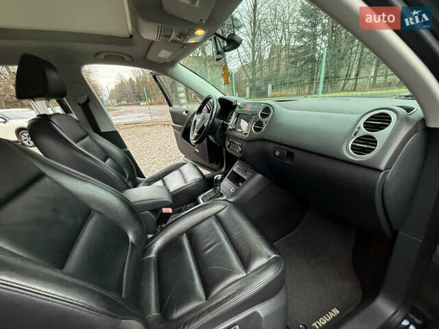Чорний Фольксваген Тігуан, об'ємом двигуна 2 л та пробігом 238 тис. км за 10599 $, фото 27 на Automoto.ua