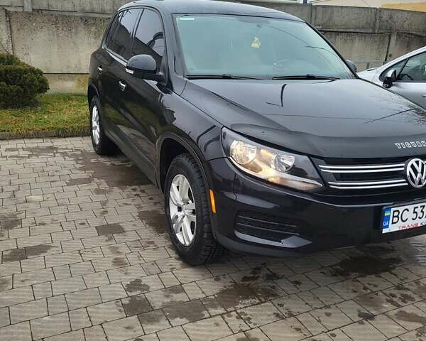 Черный Фольксваген Тигуан, объемом двигателя 1.98 л и пробегом 182 тыс. км за 9555 $, фото 1 на Automoto.ua