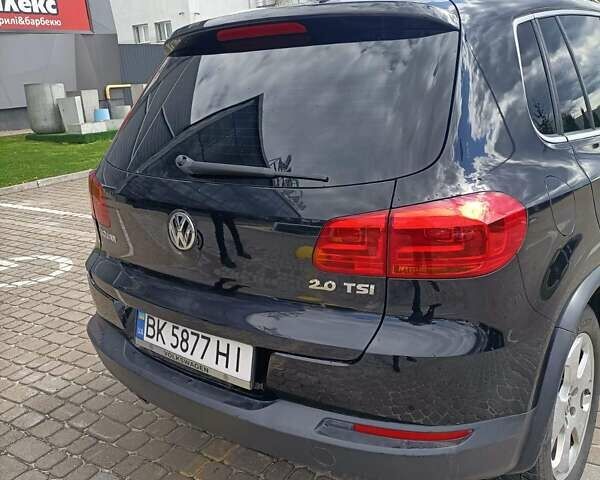 Черный Фольксваген Тигуан, объемом двигателя 2 л и пробегом 259 тыс. км за 11900 $, фото 7 на Automoto.ua