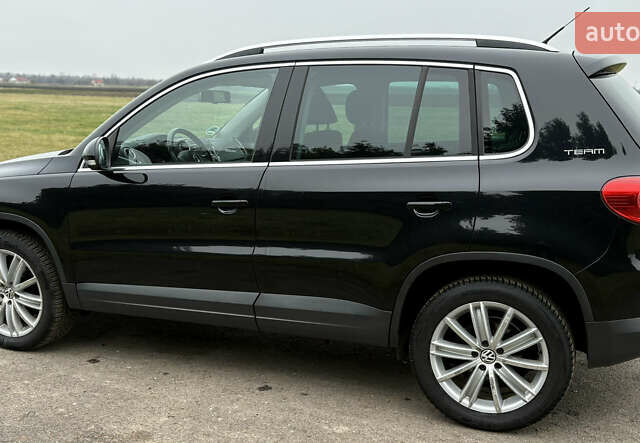 Черный Фольксваген Тигуан, объемом двигателя 1.39 л и пробегом 213 тыс. км за 9399 $, фото 3 на Automoto.ua