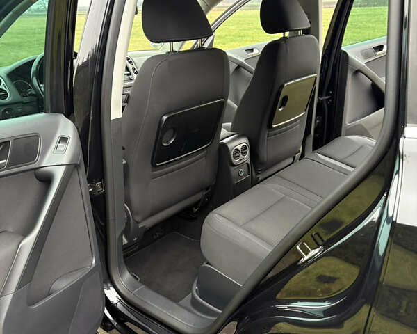 Черный Фольксваген Тигуан, объемом двигателя 1.39 л и пробегом 213 тыс. км за 9399 $, фото 27 на Automoto.ua