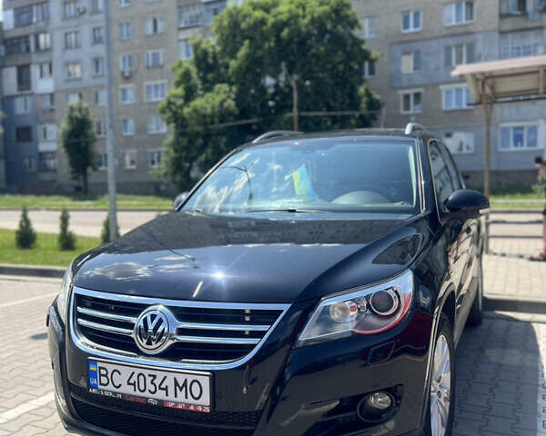 Чорний Фольксваген Тігуан, об'ємом двигуна 1.97 л та пробігом 386 тис. км за 10500 $, фото 1 на Automoto.ua