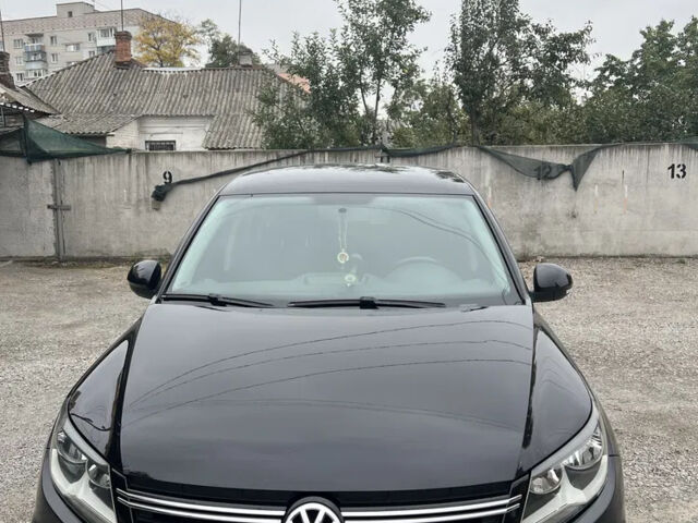 Черный Фольксваген Тигуан, объемом двигателя 2 л и пробегом 215 тыс. км за 10300 $, фото 3 на Automoto.ua